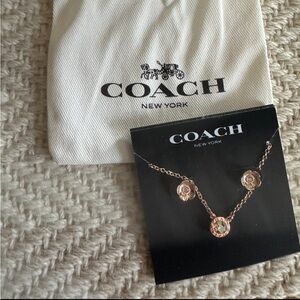 New Coach necklace and see oblects.